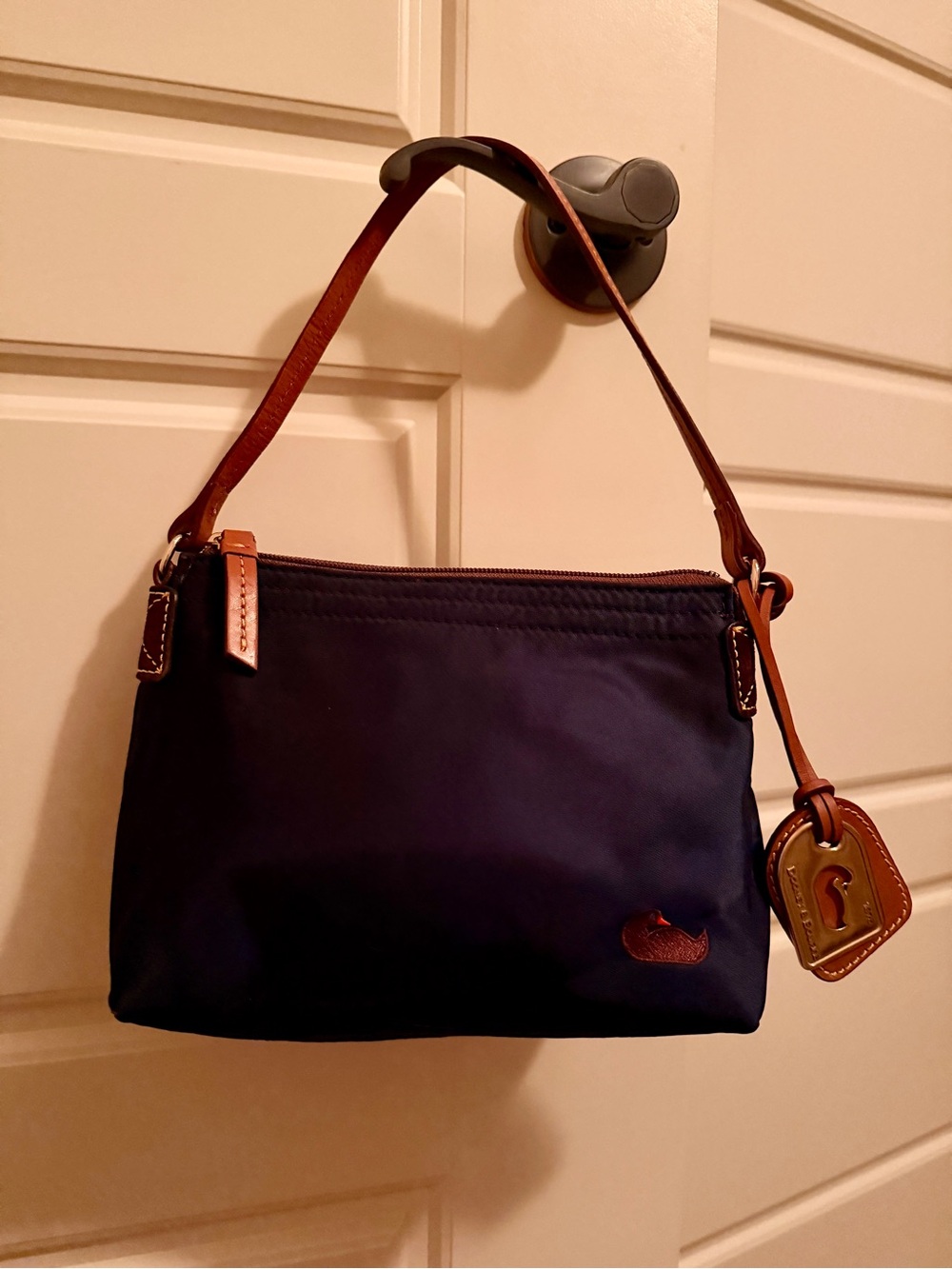 Dooney & Bourke Navy Pouchette with Brown Leather Trim